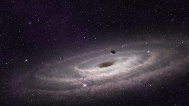 Two supermassive black holes discovered together, 300 light-years away