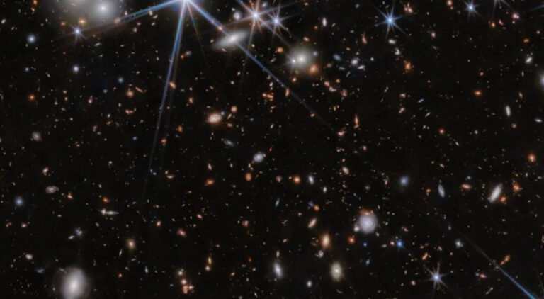 Astronomers Spot Universe's Most Distant Interacting Supermassive Black Holes: A Cosmic Dance 13 Billion Years in the Making!