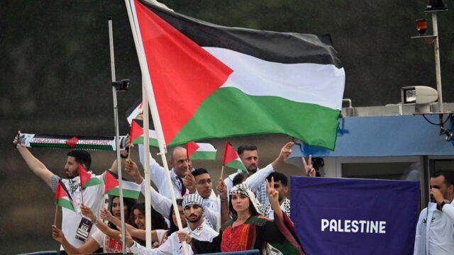 Palestinian athletes protest against Israel at the opening of the Paris Olympics