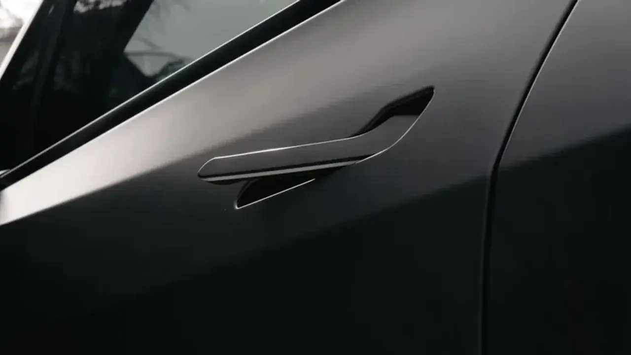 Tesla and 10 Automakers Recall 4 Million Vehicles Over Handles