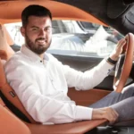 Bugatti CEO Mate Rimac sitting in a hypercar, whose Bugatti Chiron was stolen